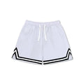 Men's loose blue sports shorts made from polyester fabric on a plain background.