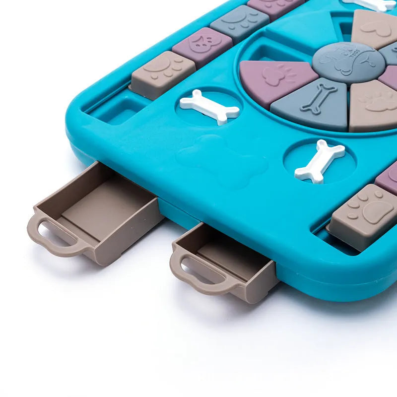 Blue interactive dog puzzle toy with four switches and sliding panel on anti-skid base