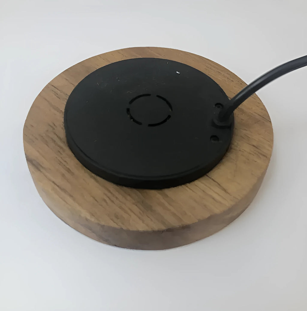 Black 60mm round wireless phone charger for embedded desk and table installation