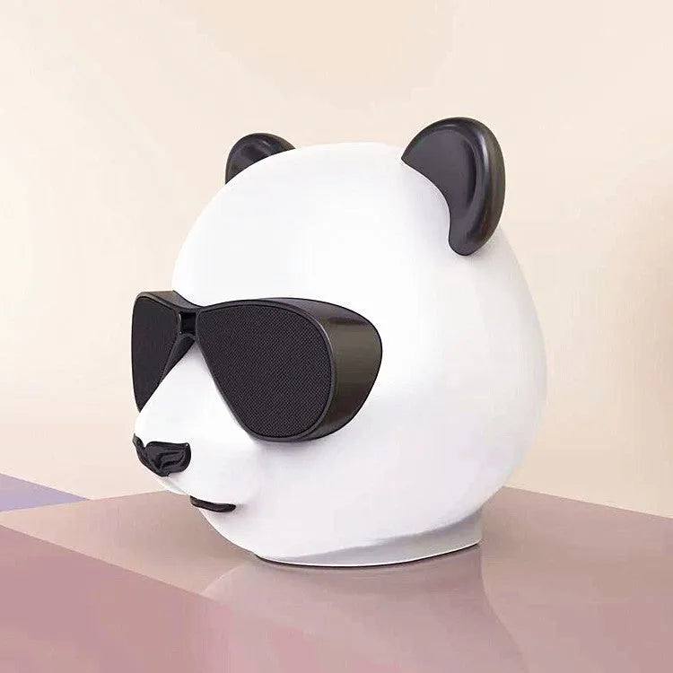 Classic style portable mini Bluetooth speaker showing front grille and compact design.