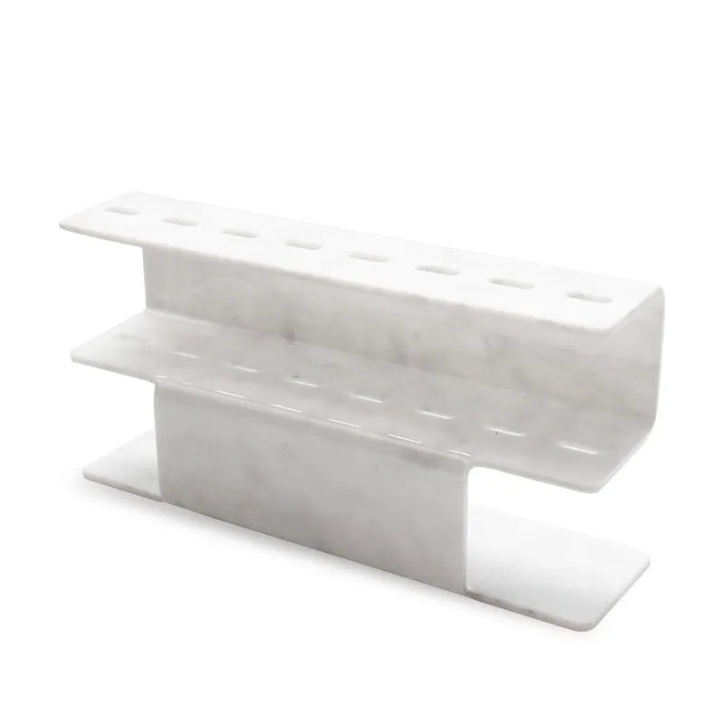 Acrylic tweezers display stand in white finish holding multiple tweezers upright