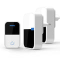 Modern white plastic wireless doorbell kit with receiver and beeper units on a plain background.