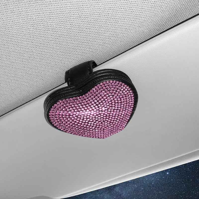 Black diamond-encrusted PU leather car sun visor clip holding sunglasses and a ticket.