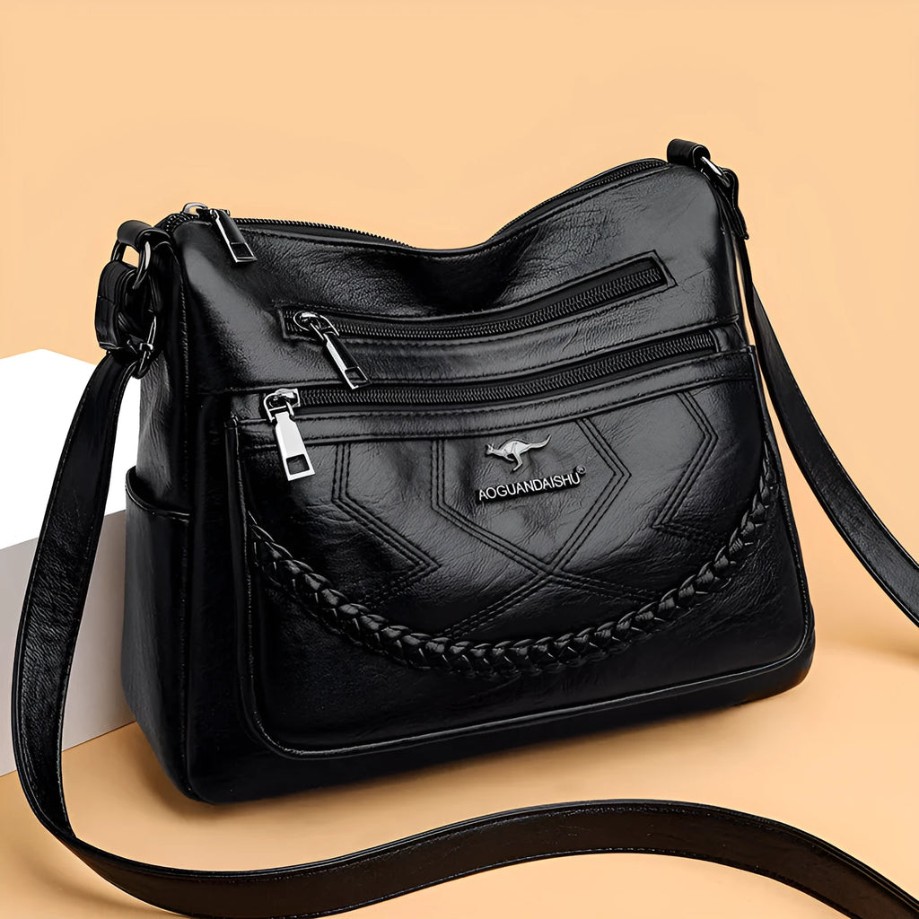 Soft PU leather shoulder bag with zippered compartments in horizontal square shape