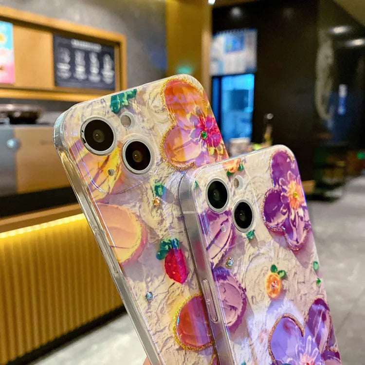Purple and yellow soft rubber phone case with oil painting flower design and glittering diamond glue details.