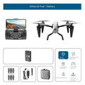 White KS66 alloy UAV drone with remote control and accessories on a table.