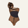 Gold coloured one-piece swimsuit with a halter neck and hollow-out design on a mannequin.