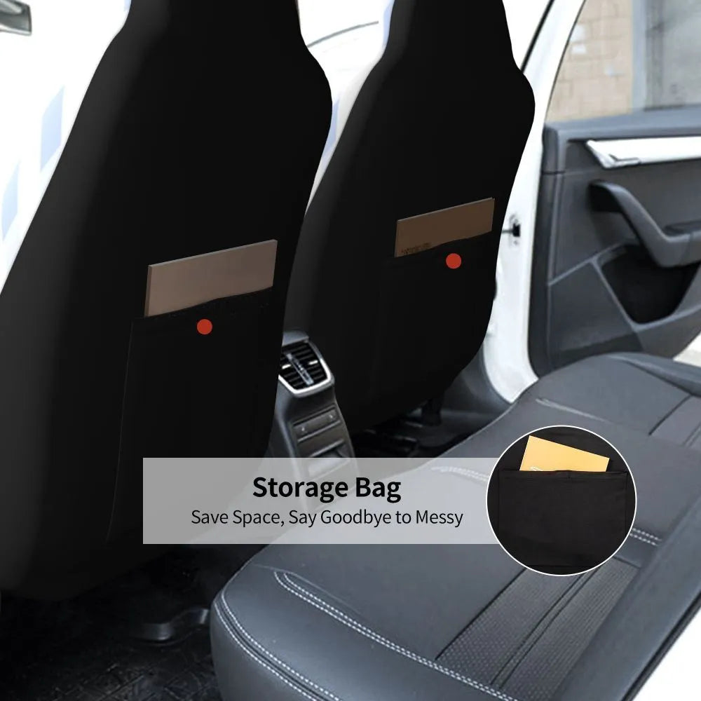 Black polyester car seat cover with elastic straps, foam padding, and rear pocket installed on a car seat