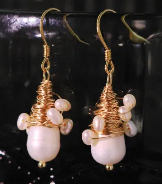 Handmade natural pearl embellished wire-wrapped earrings in geometric round shape for women