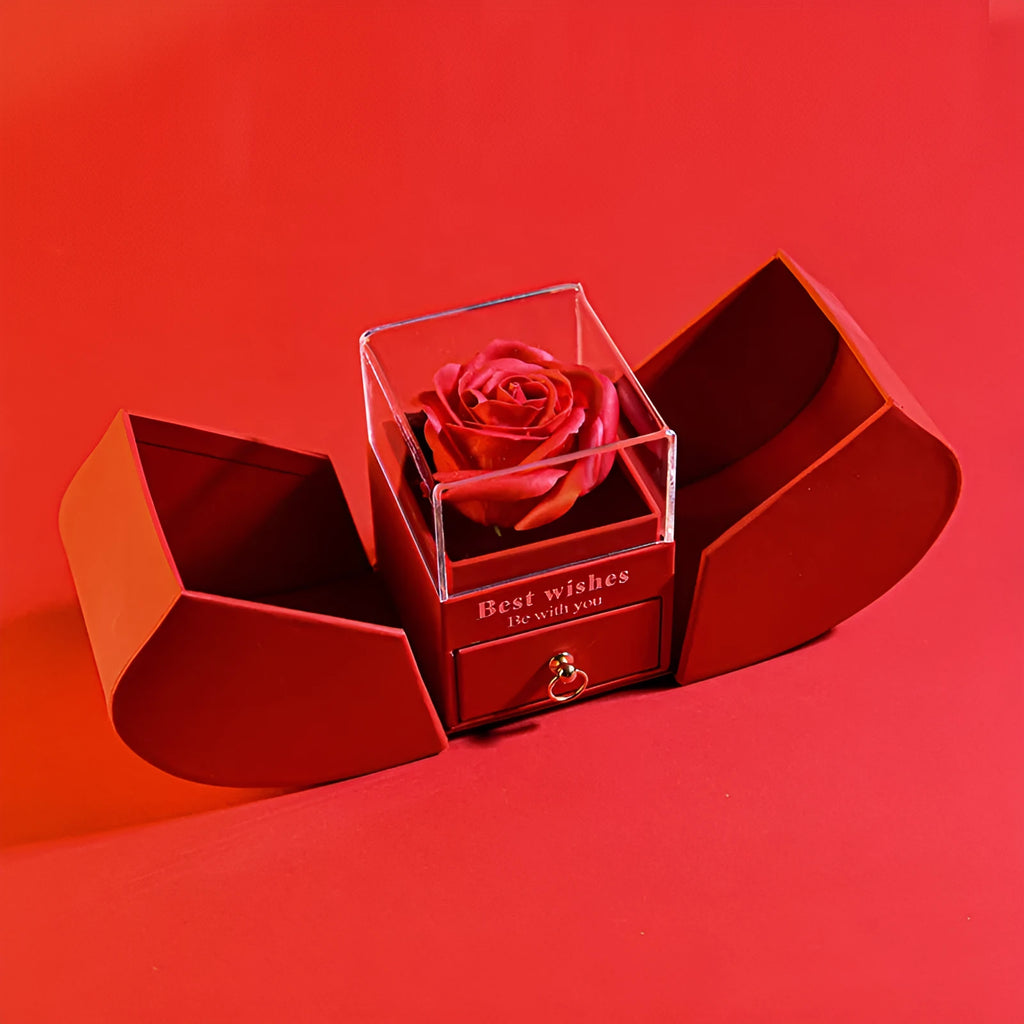 Red eternal rose necklace in apple-shaped jewellery gift box on display