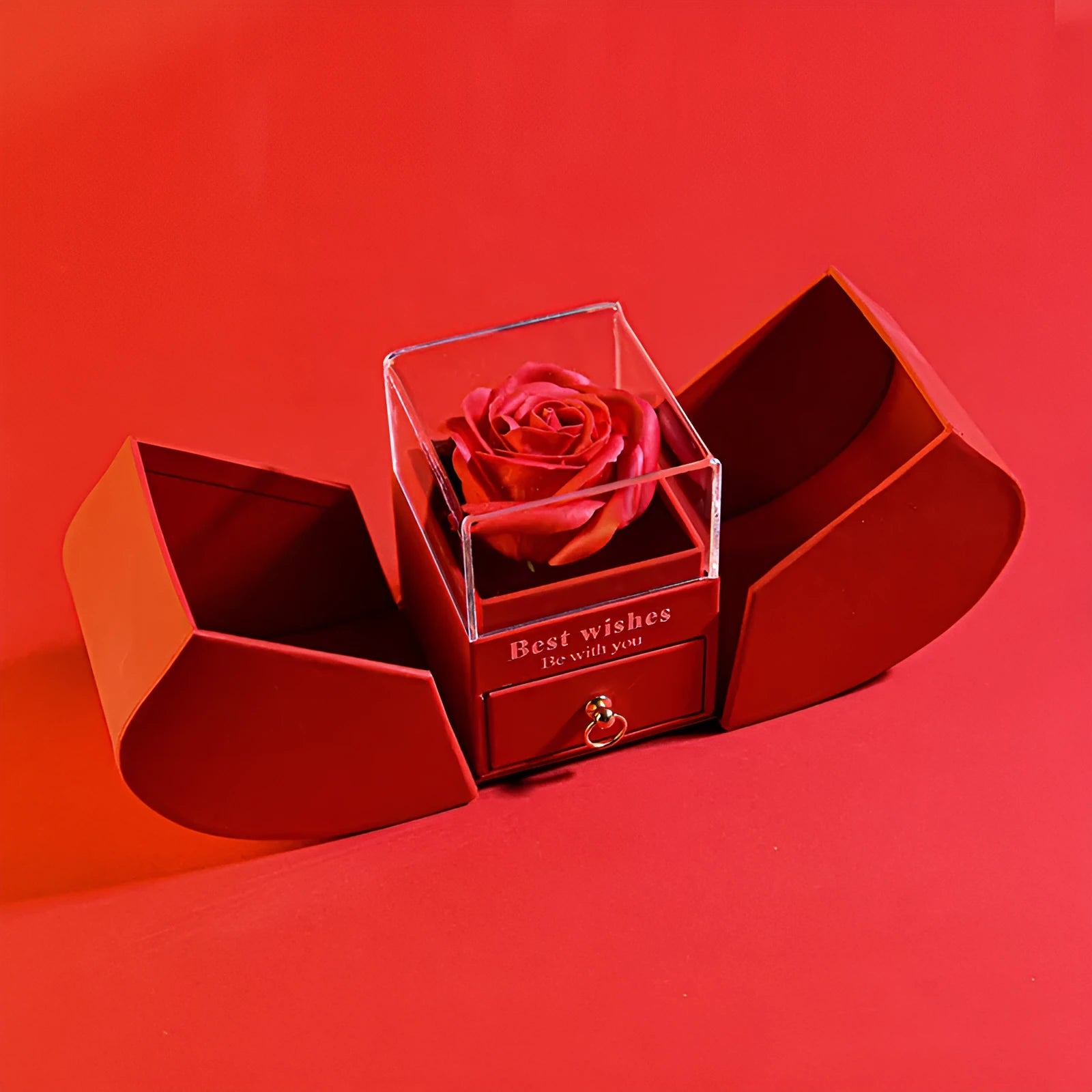 Red eternal rose necklace in apple-shaped jewellery gift box on display
