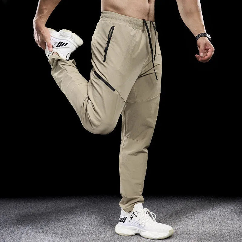 Men's waterproof quick-drying nylon workout pants in multiple colours for sports fitness