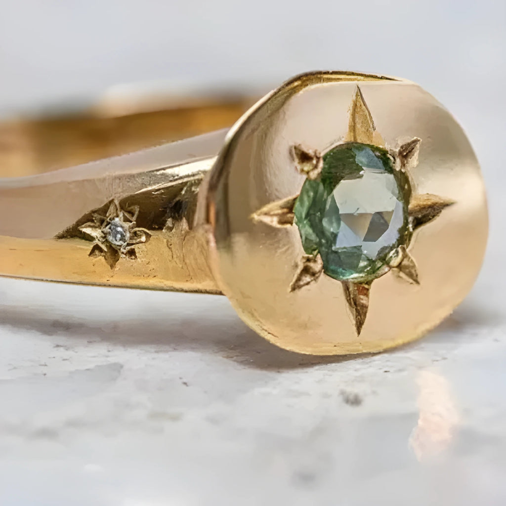 Golden star-shaped ring with oval zircon detailing and adjustable opening