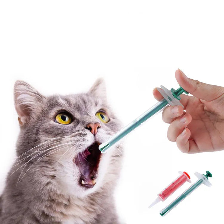 Two silicone pet pill shooter dispensers with soft tips for feeding medicine to cats and dogs