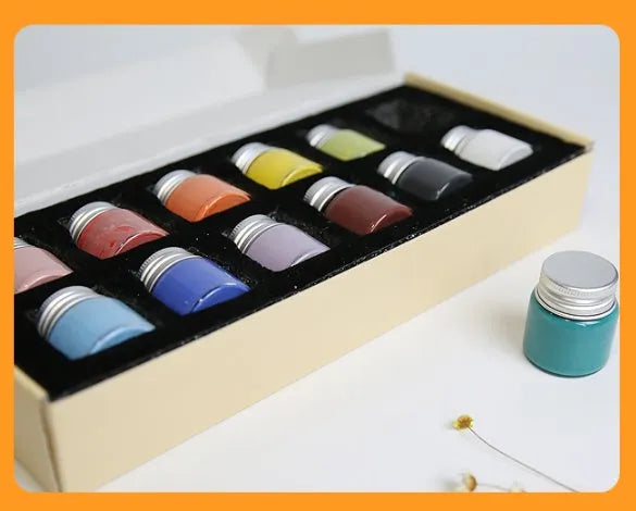 Three 25g pots of Morandi ceramic glaze paint in Lilac, Plant Ash and Verdant colours for high-temperature pottery firing