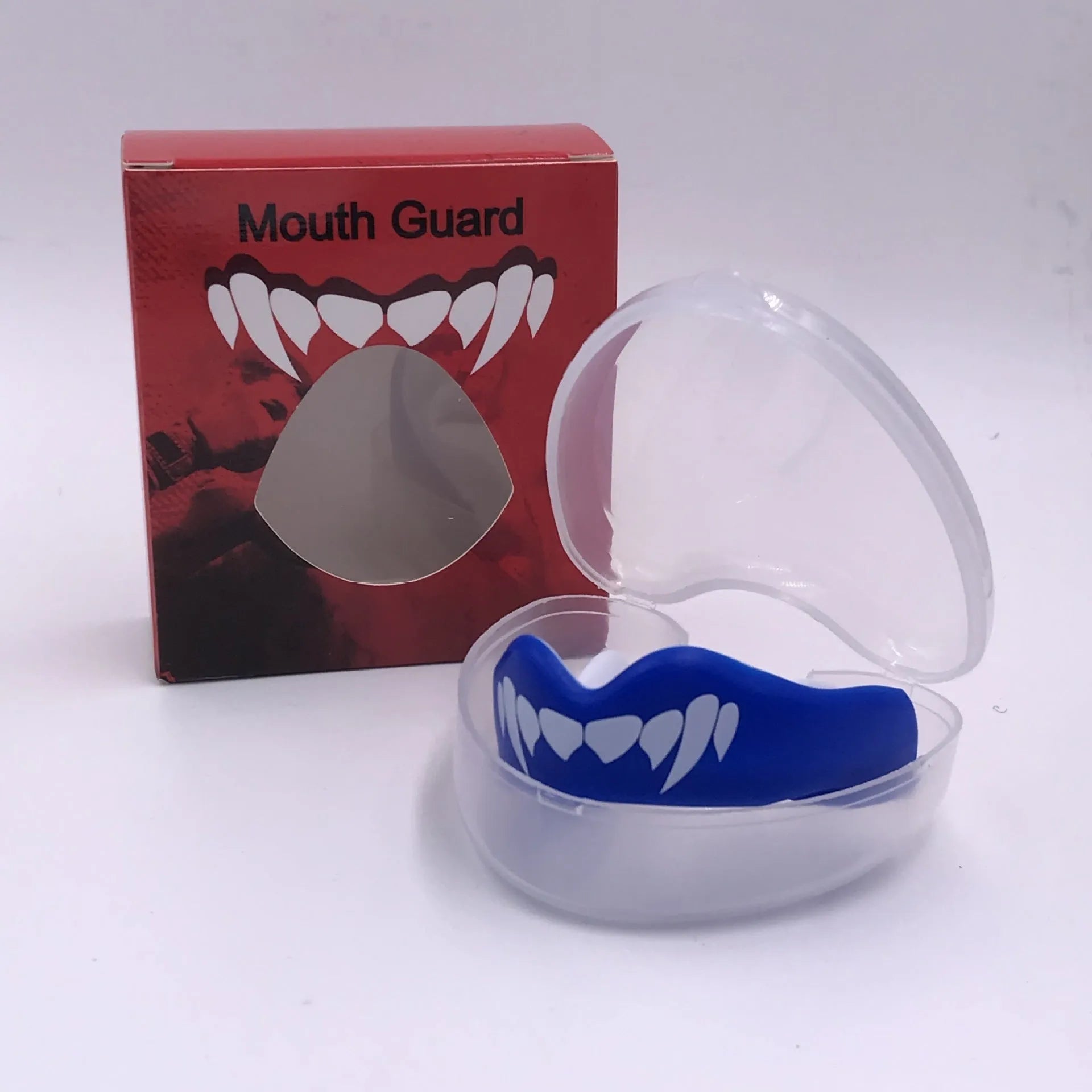 Adult boxing mouthguard with printed tooth design in black and white, for martial arts and fight sports.