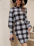 Black women's dress with lantern sleeves and leather stitching details, mid-length tight skirt silhouette