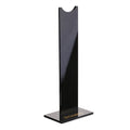 Pink detachable gaming headset stand with non-slip silicone base on a desk
