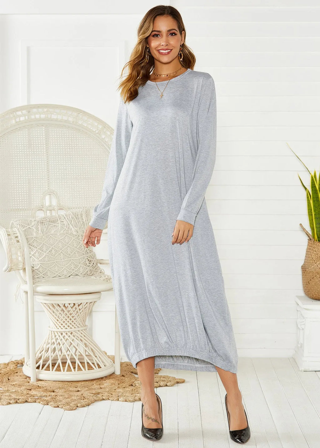 Black lantern dress with lace-up crew neck and loose long silhouette
