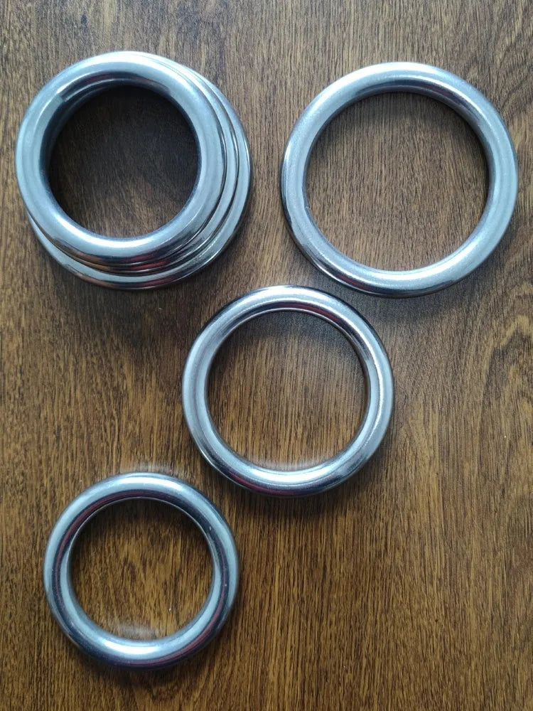 Wing Chun carbon steel training ring with electroplated finish, shown in small, medium, and large sizes.