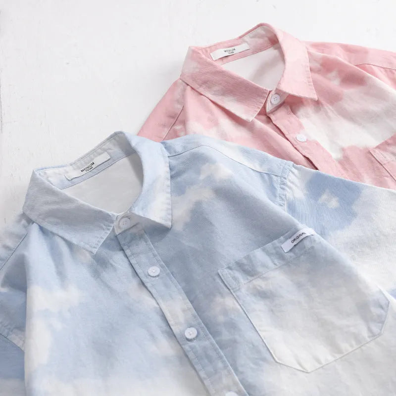 Men's light pink short-sleeved cotton shirt with loose cardigan style on hanger