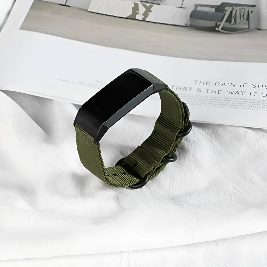 Nylon three-ring buckle replacement strap for Fitbit Charge 2, 3, 4, and 5 fitness trackers in army green colour.