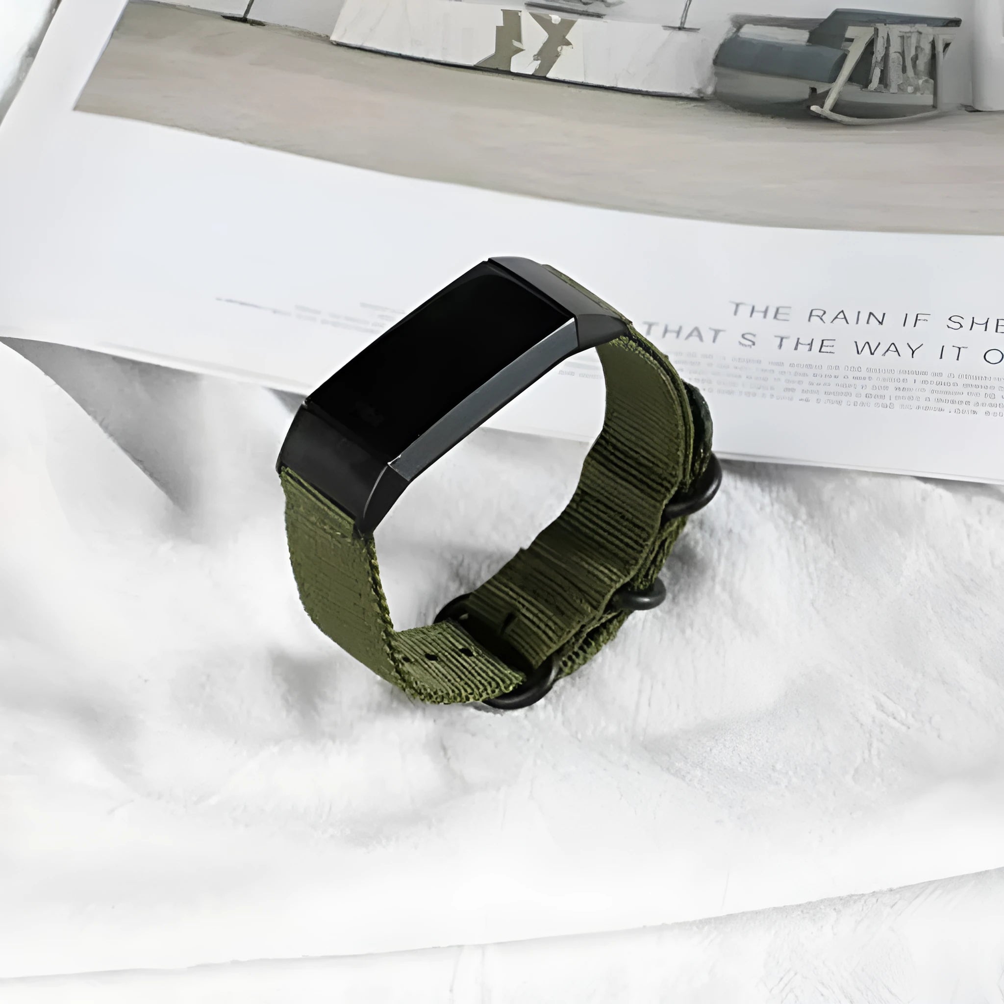 Nylon three-ring buckle replacement strap for Fitbit Charge 2, 3, 4, and 5 fitness trackers in army green colour.
