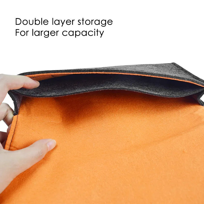 Black felt pouch case for Nintendo Switch showing game card slots and double-layer storage design
