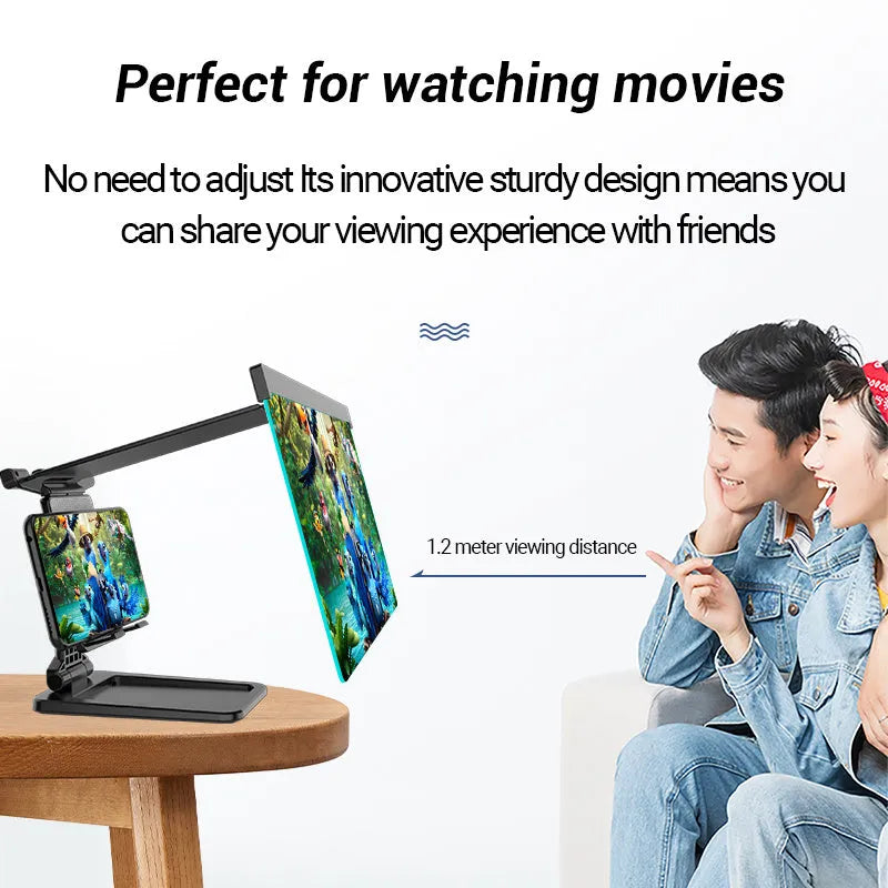 Black folding mobile phone screen amplifier with detachable holder on desktop