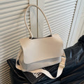 Vintage casual PU tote bag in horizontal square shape with double straps and sewn thread detailing.