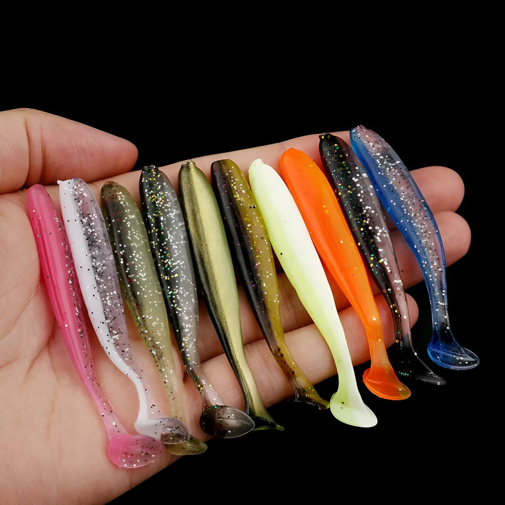 Close-up of a two-tone soft plastic T-tail fishing lure measuring 7cm, shown in one of 14 available colour styles.