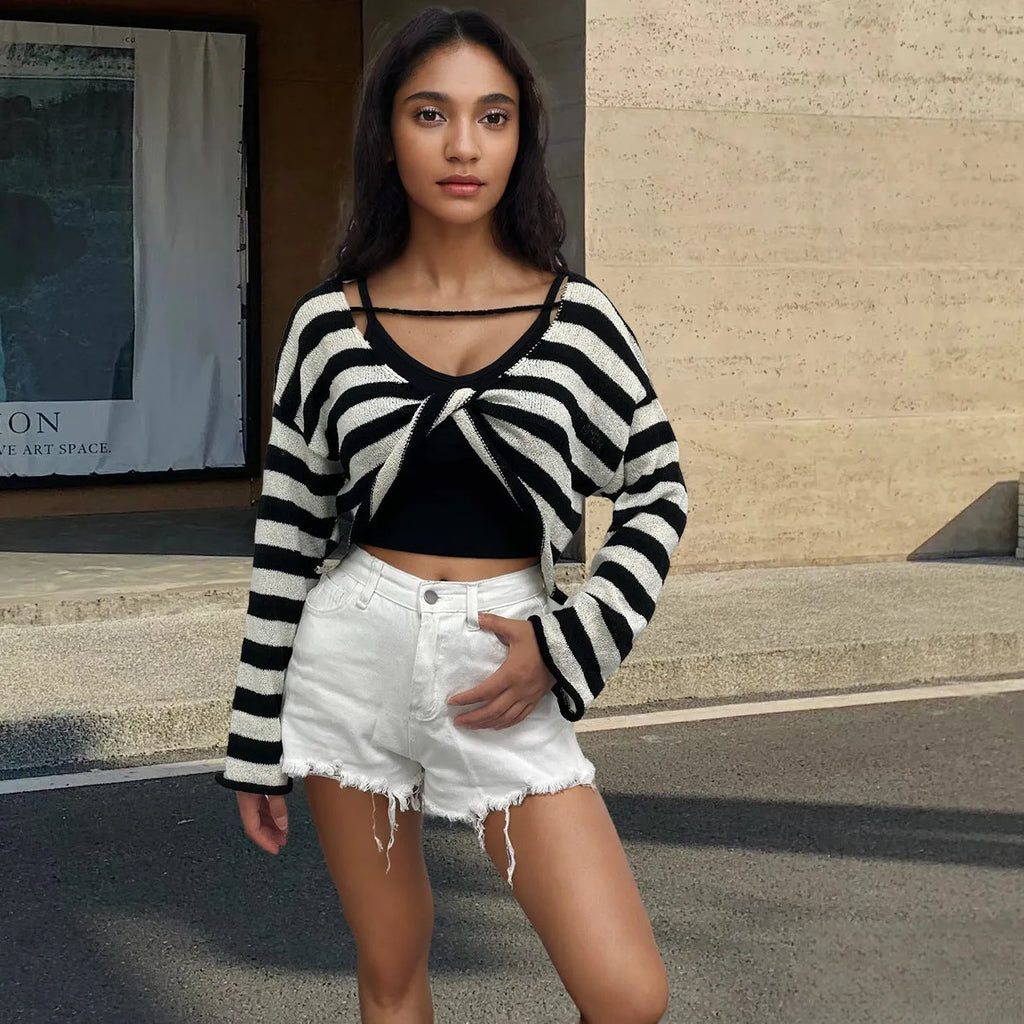 Long-sleeved striped pullover sweater in mercerised cotton shown in multiple colours.