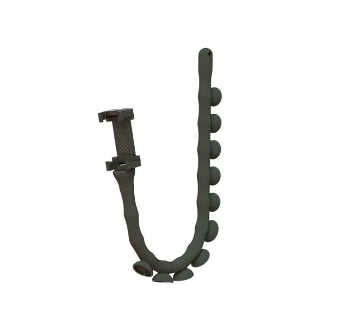 Flexible rubber phone holder with suction cup mounted on a surface showing 360-degree rotation capability