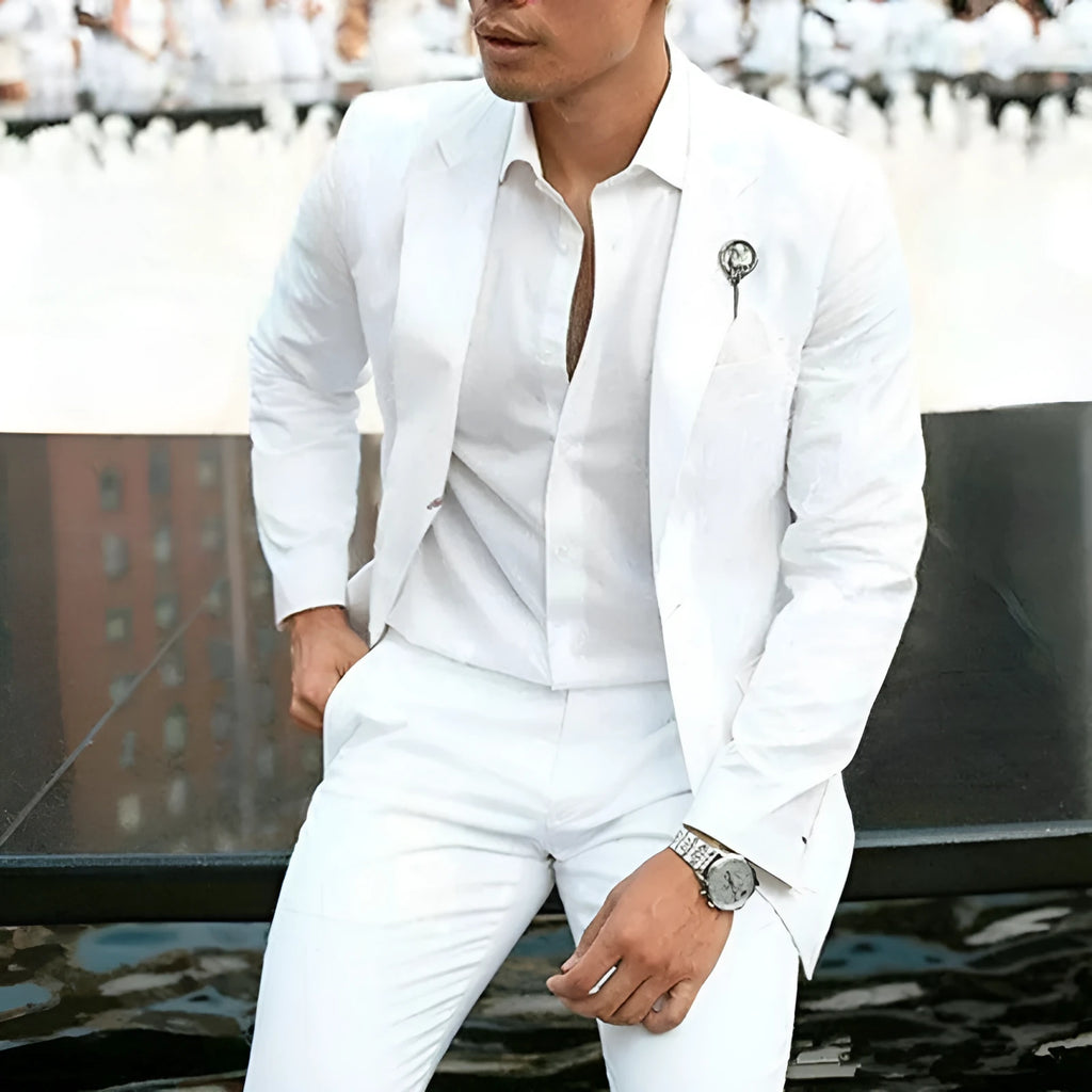 White slim fit two-piece men's suit jacket and trousers for weddings.