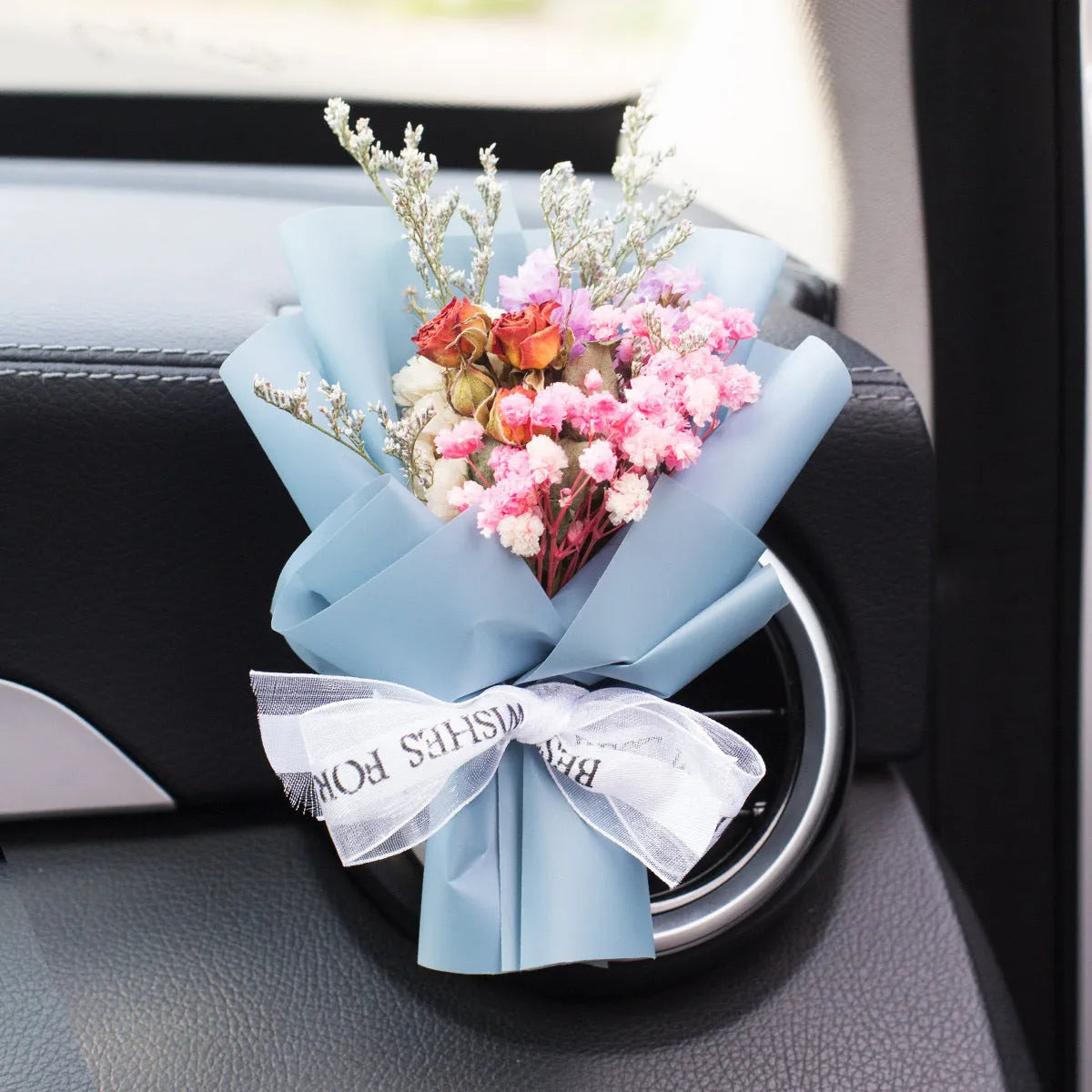 Handmade dried flower car air freshener ornament in multiple colours mounted on car vent
