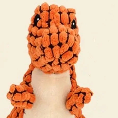 Four grey, green, and orange bite-resistant dog toys with sound features on a white background.