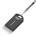 Small black and silver metal USB flash drive showing compact size next to a ruler for scale