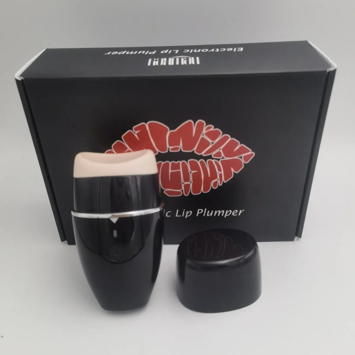 Electric silicone lip plumper device with 3-speed adjustment in black or white colour