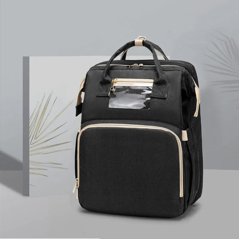 Folding baby bag bed backpack with portable mattress, USB charging option, front pocket, and multiple colour choices