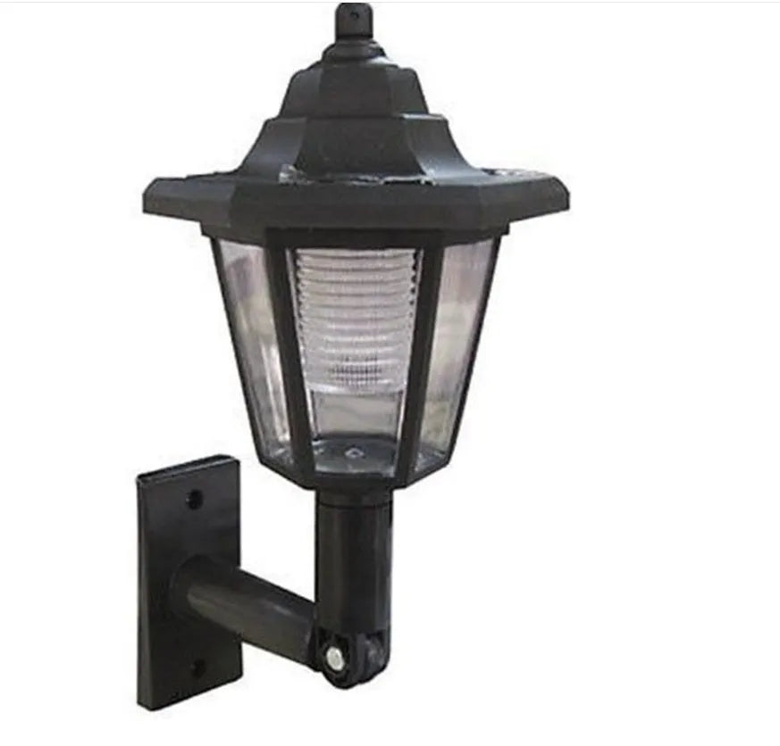 Black hexagonal solar wall lamp for outdoor garden lighting with automatic light sensor