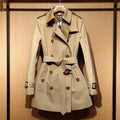 Women's khaki double-breasted trench coat with flight sleeves, British style