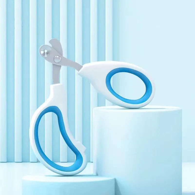 Blue cat nail clippers with circular cut hole design and cushioned handle for safe pet nail trimming