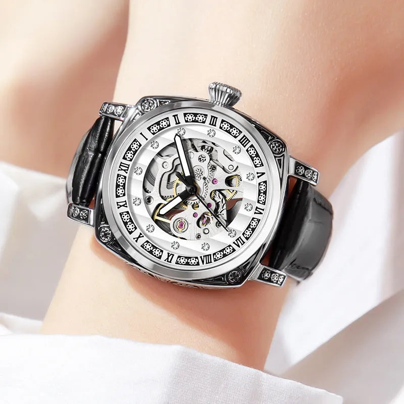 Men's mechanical analogue watch with luminous hands on a leather strap, shown in multiple colour options.