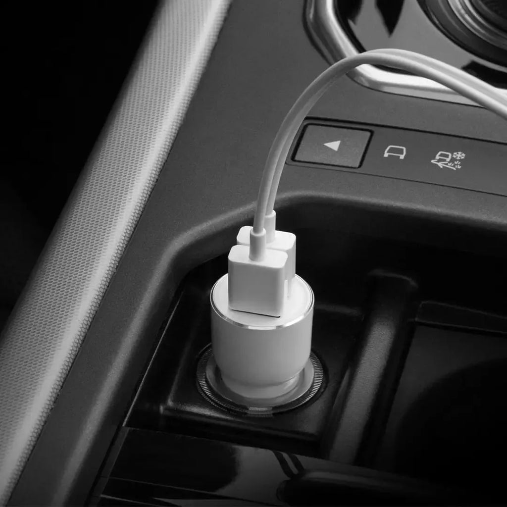 Black Ruimi 3S Music Bluetooth Car Charger with dual USB ports for in-car use.