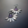 Purple Bohemian style earrings with animal zodiac design and floral elements
