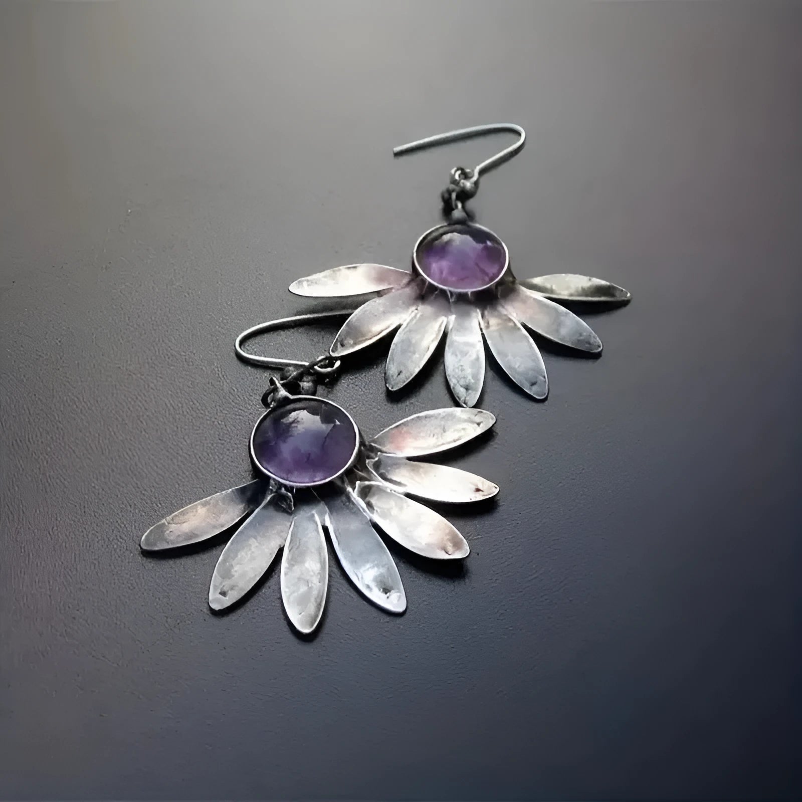 Purple Bohemian style earrings with animal zodiac design and floral elements
