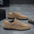 Men's casual slip-on loafers in brown with round toe, stitching, and non-slip plastic outsole