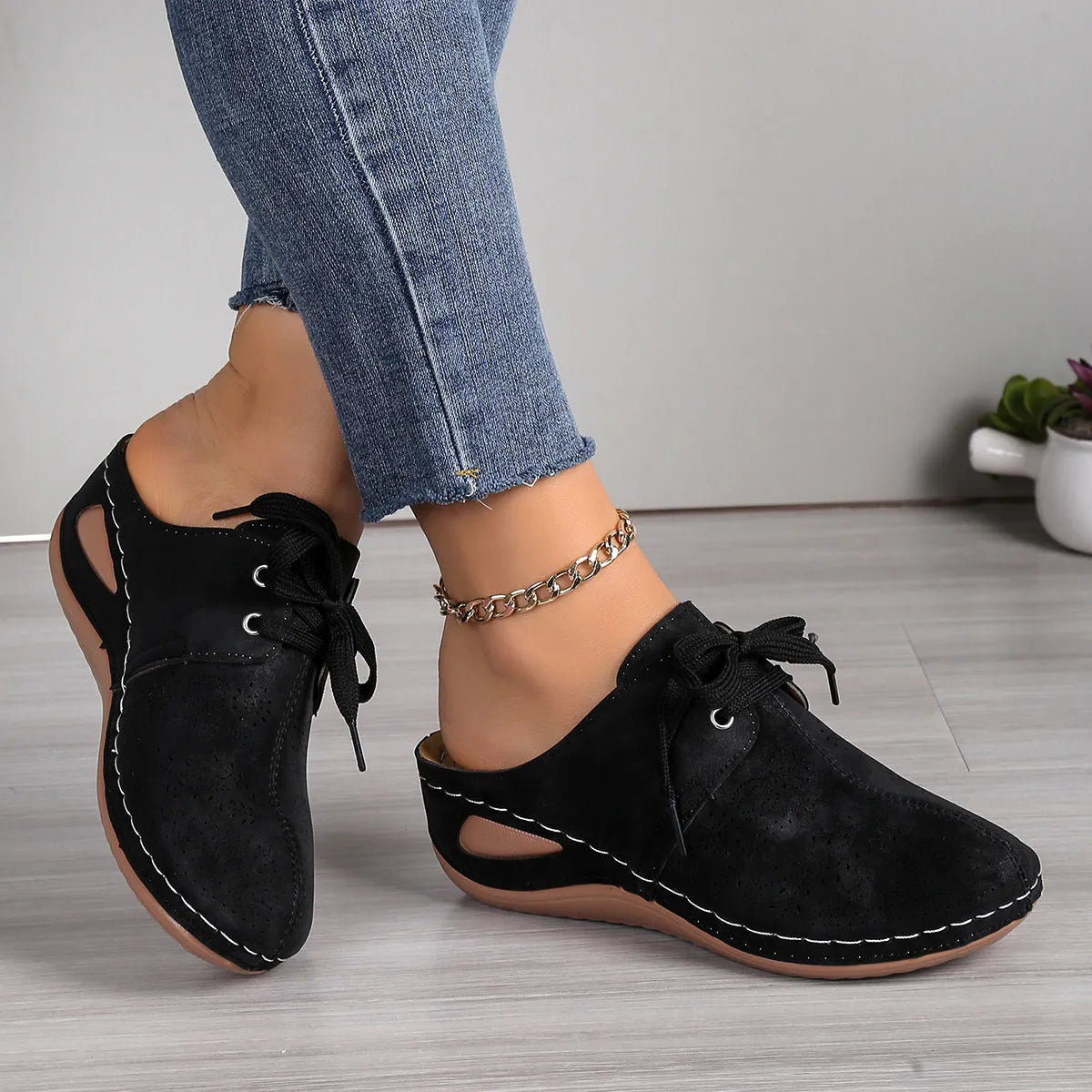 Women's baotou lace-up slippers with hollow-out wedge design in suede and rubber construction