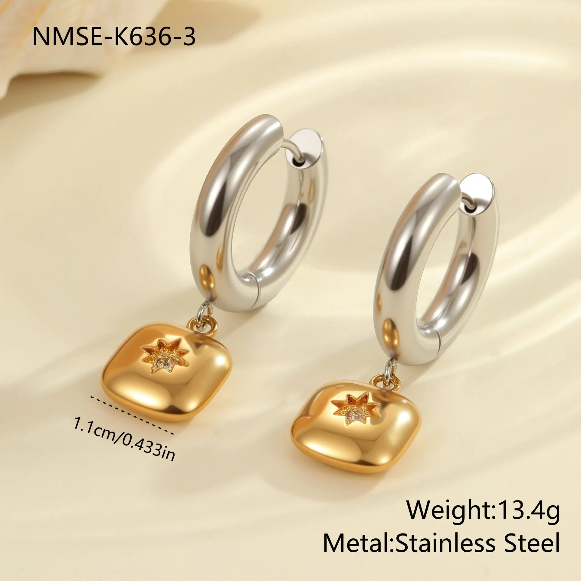 Christmas tree heart earrings in stainless steel with 18K gold plating showing star and geometric shapes