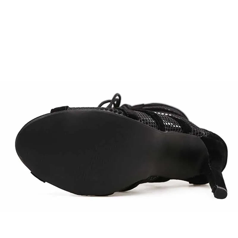 Black suede women's lace-up high heel shoes with an 11.5cm heel on a white background.